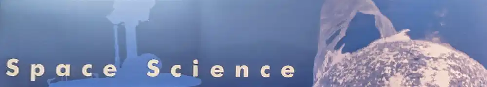 Two large exhibition display panels hung on a silver metal barrier system form a corner exhibition area. White text and graphics are shown on a dark blue background. A large case contains small objects and instruments including the Mars Ingenuity Helicopter.