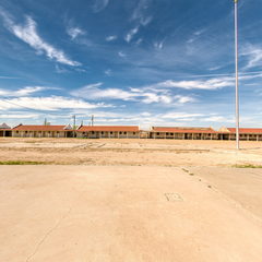 Adobe buildings and open ground at Rio Vista