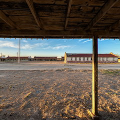 Long Mission Revival adobe building at Rio Vista