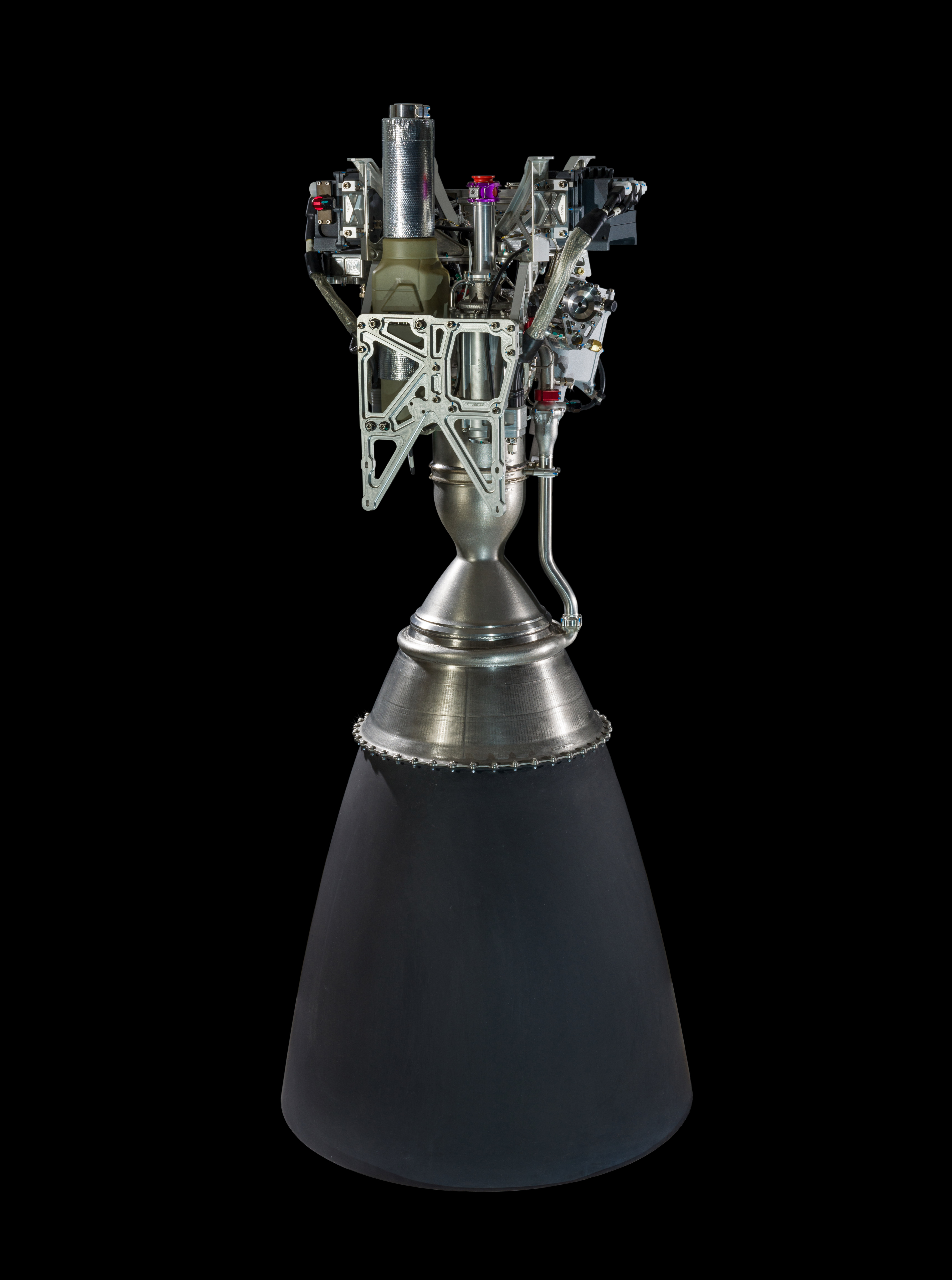 A rocket engine with 3D-printed components, including a cooled thrust chamber, injector, pumps, and propellant valves.