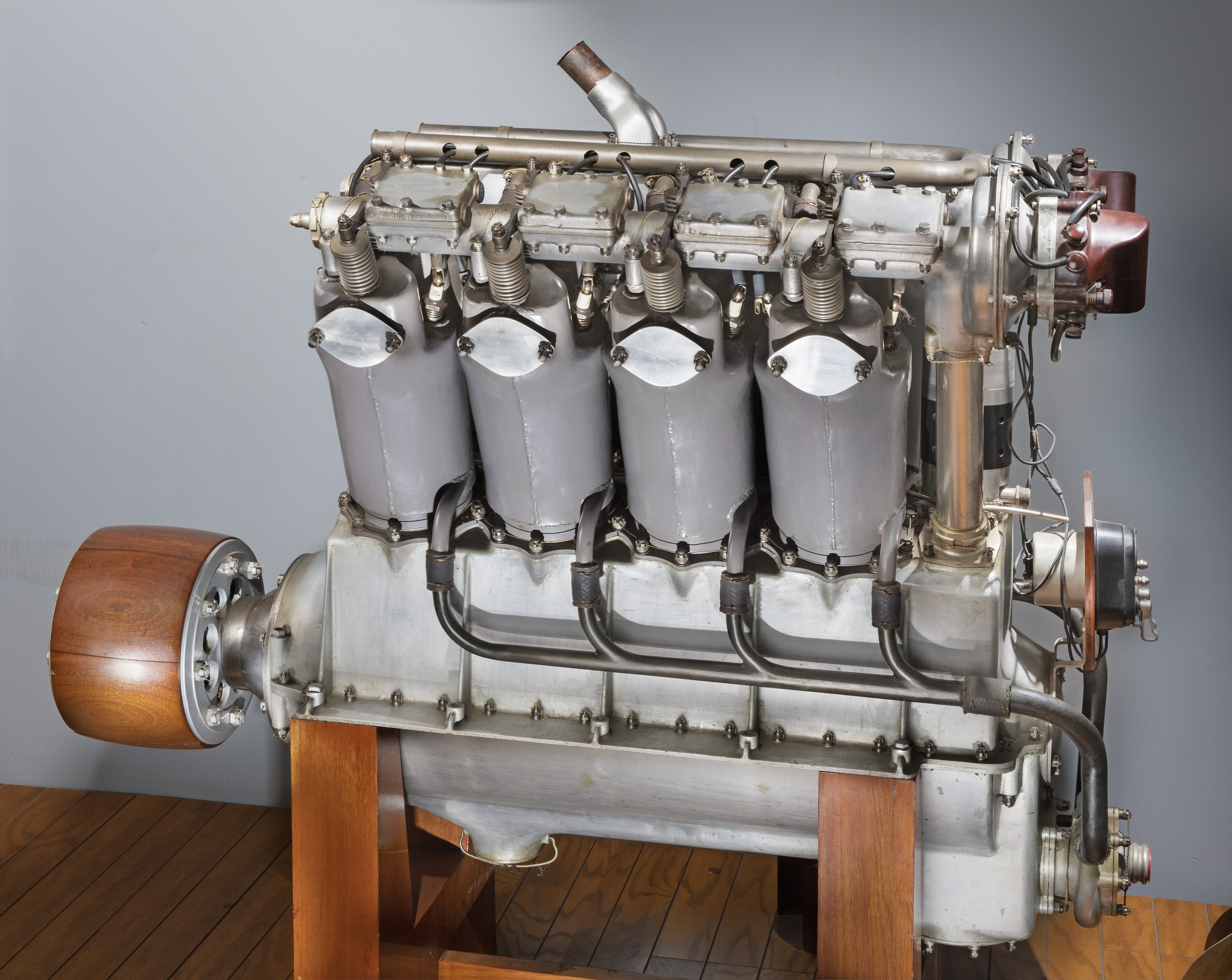 Large rectangular Liberty L-8 prototype engine with two banks of four cylinders.