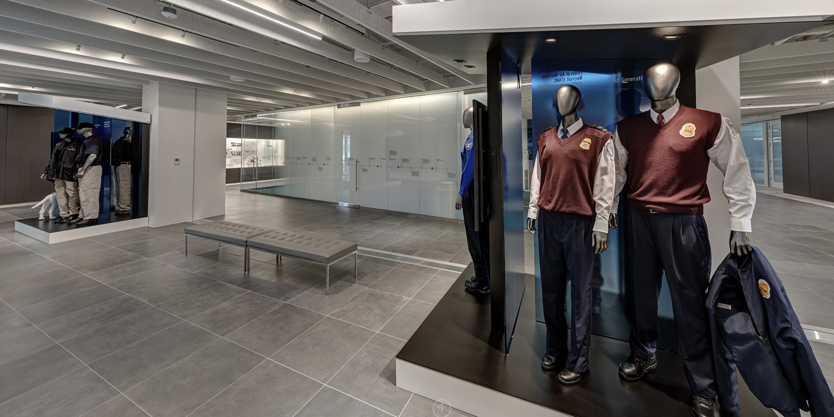 Uniform displays and a timeline inside Mission Hall