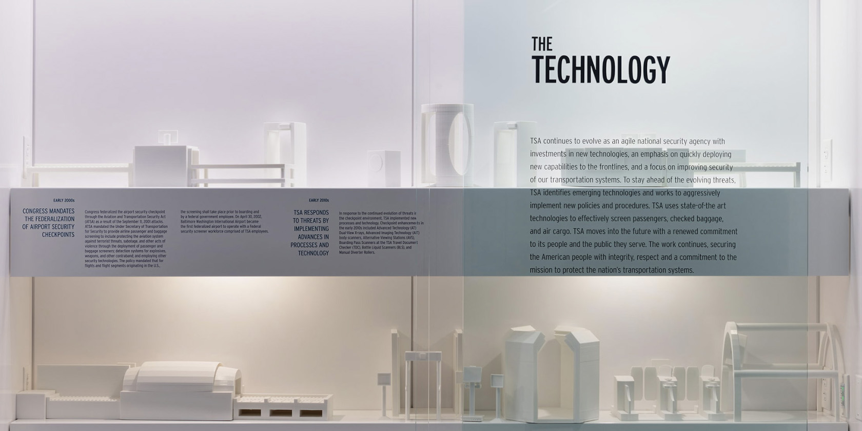 Technology exhibit with screening equipment and historical interpretation